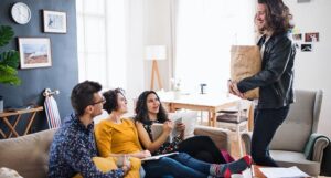 A group of young friends indoors at home, house sharing concept.