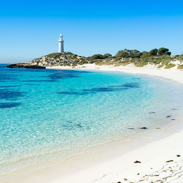 Summer day at Pinky Beach and the Bathurst Lighthouse on Rottnest Island, Perth, Western Australia