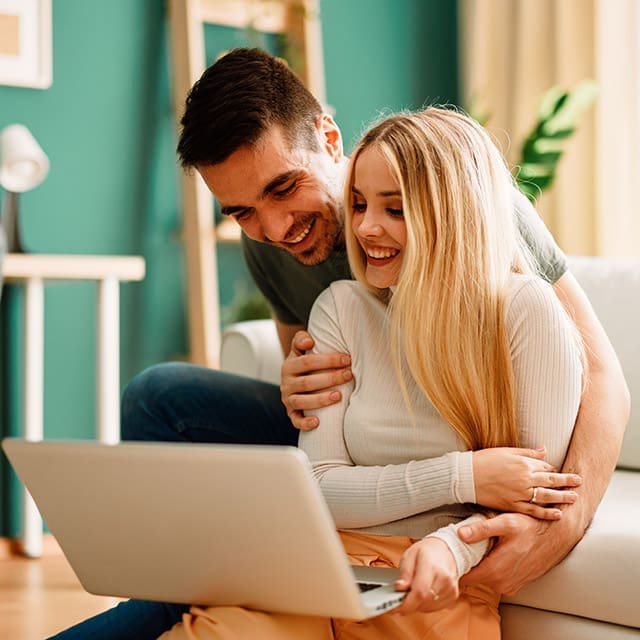 Young couple researching first home loans