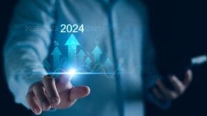 Interest rate and dividend concept. Businessman with percentage symbol and up arrow, 2024, Interest rates continue to increase, return on stocks and mutual funds, long term investment for retirement.