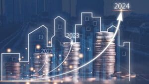 Concept of business prosperity and asset management, Real estate investment marketing analysis, Stack of coins with graph of business growth, Planning to increase profits from doing business.